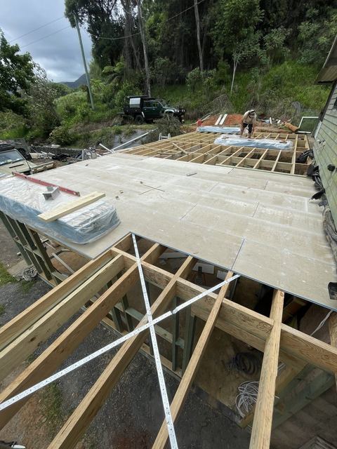 Deck frame built on a sloping block