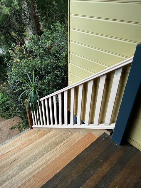 New white timber balustrade and handrail on a set of stairs